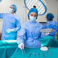 Disposable Blue Isolation Surgical Gowns Available in 30 / 50 & 100 Packs
